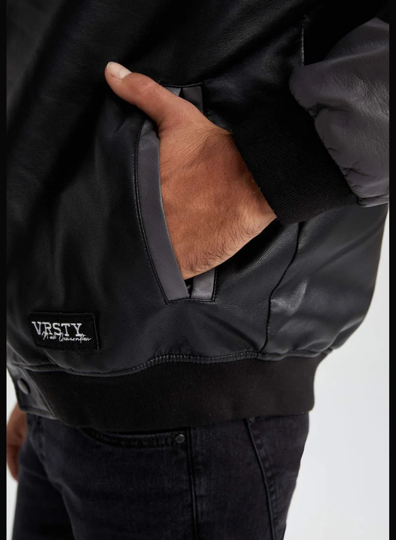 ديفاكتو Man Oversize Fit Hooded PU Jacket
