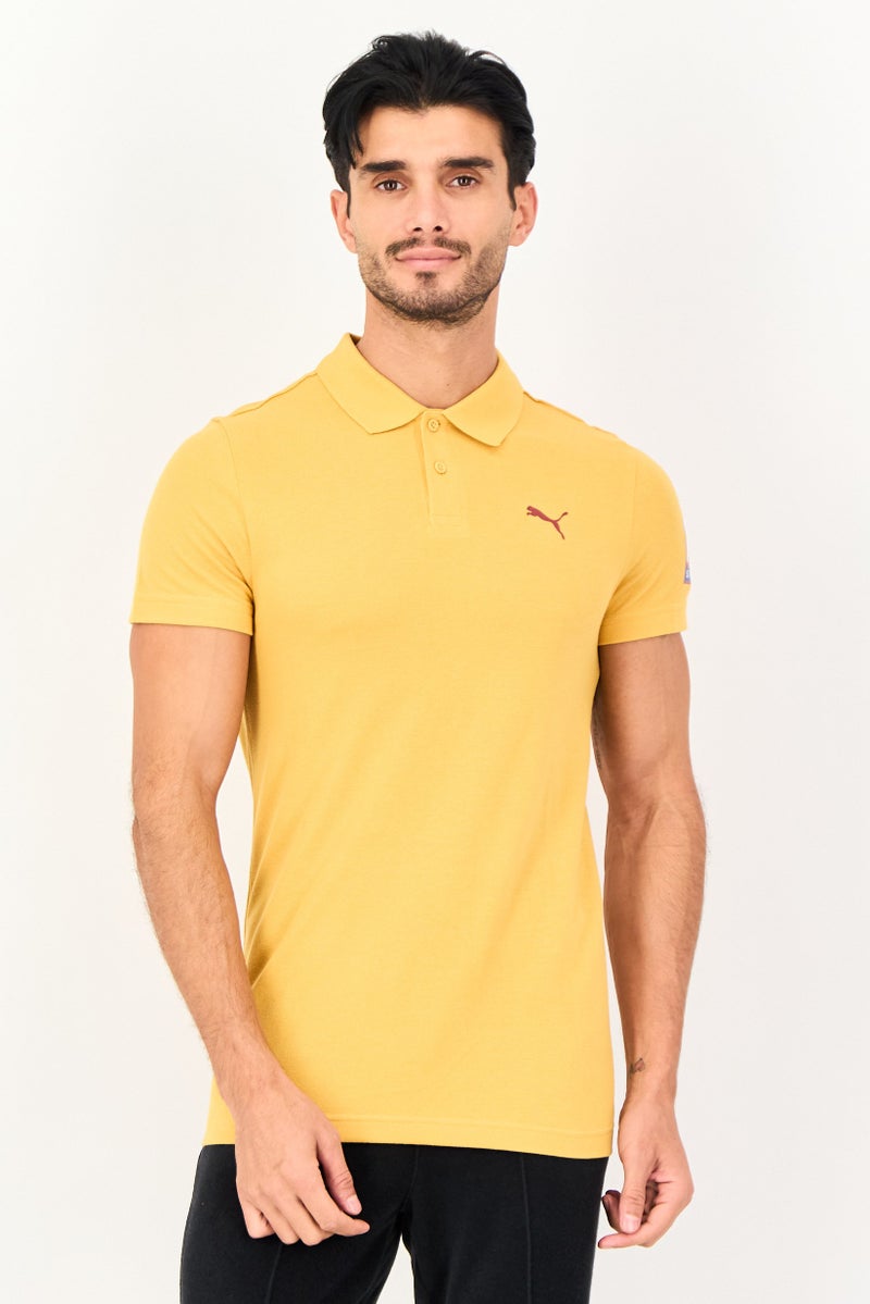 PUMA Men Slim Fit Brand Logo Short Sleeve Outdoor Polo Shirt, Yellow - Image 1