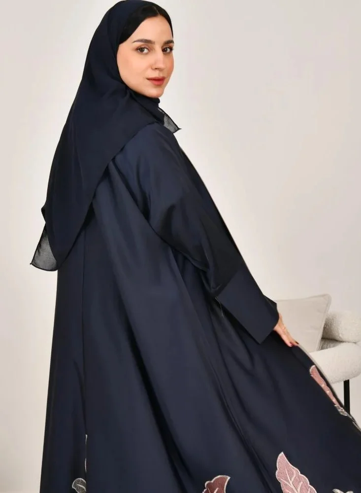 lamha abaya Navy blue wrap abaya with soft fabric and elegant embroidery at the bottom of the abaya