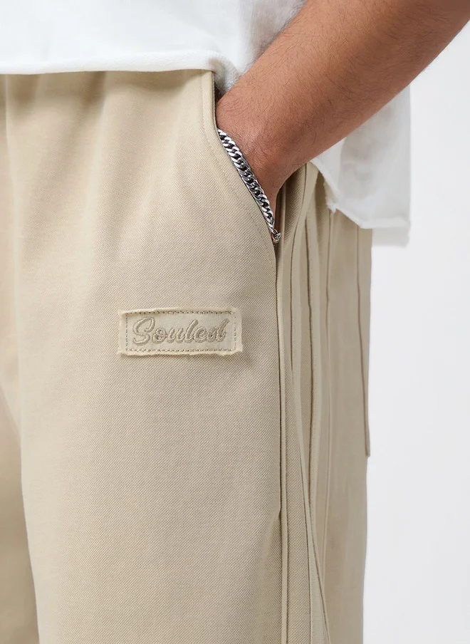 The Souled Store  The Souled Store Men Oversized Fit Printed Cream Joggers  | Best Price UAE