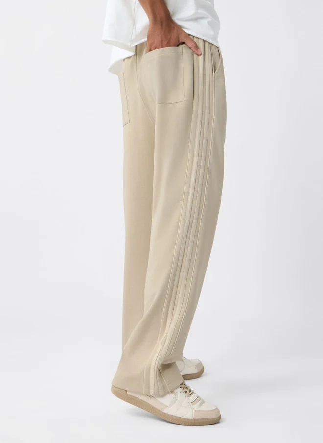The Souled Store  The Souled Store Men Oversized Fit Printed Cream Joggers  | Best Price UAE