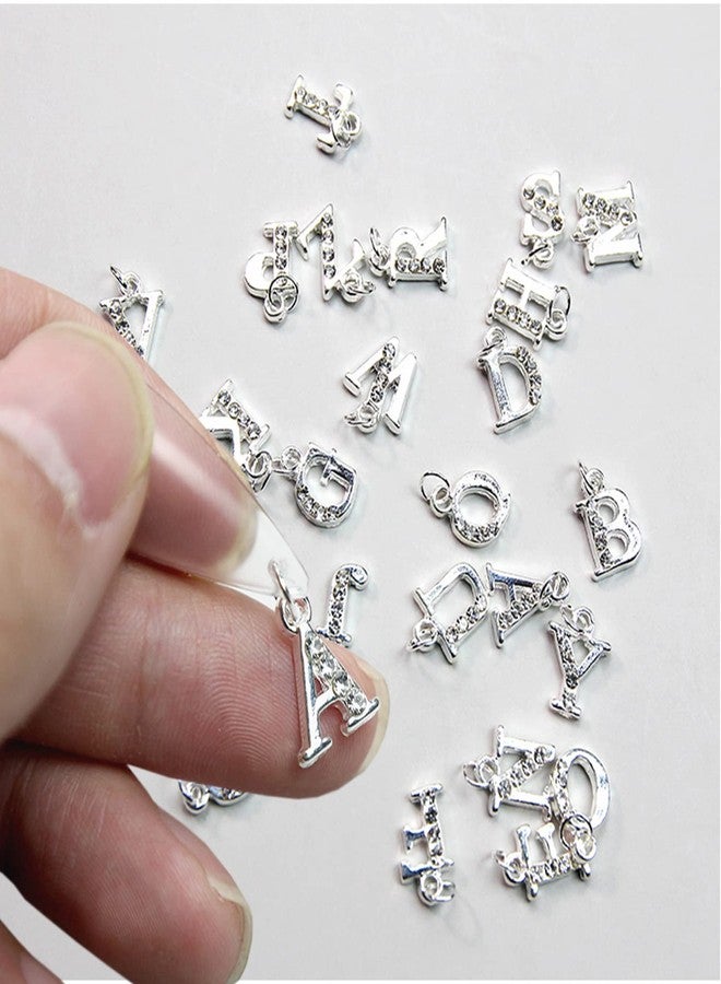 Vezocim زينة أظافر حروف فضية، 26 حرف من A-Z، لؤلؤة أظافر رينستون، تصميم لامع من سبائك الألمنيوم، مستلزمات أظافر ماسية معدنية لتزيين المانيكير للنساء، حرف يدوية لصنع المجوهرات - Image 1