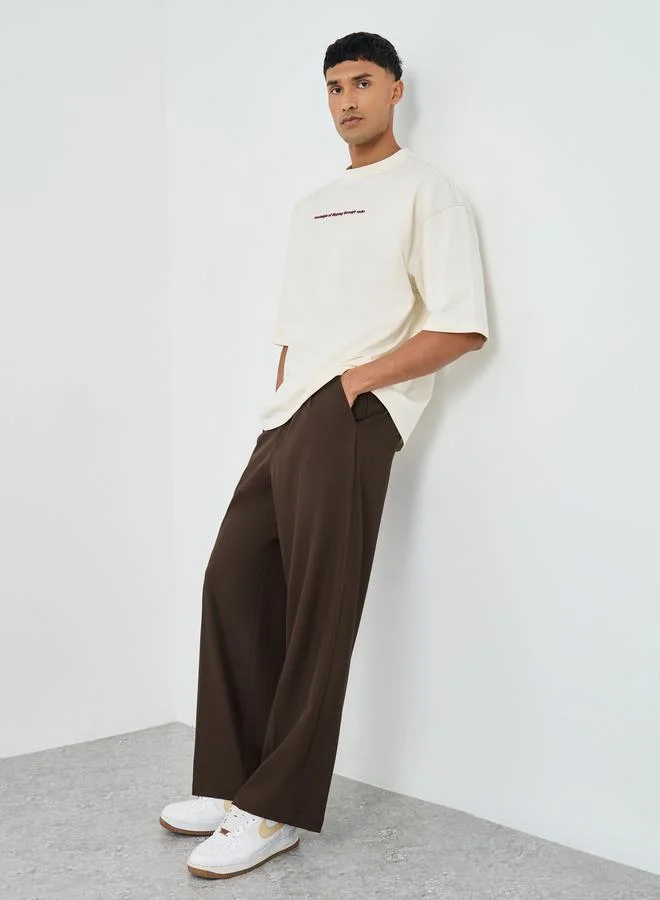 ستايلي Styli Men Brown Oversized Double Pleated Trousers
