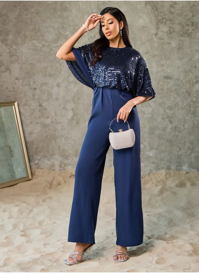 ستايلي Sequin Cape Sleeve Wide Leg Jumpsuit