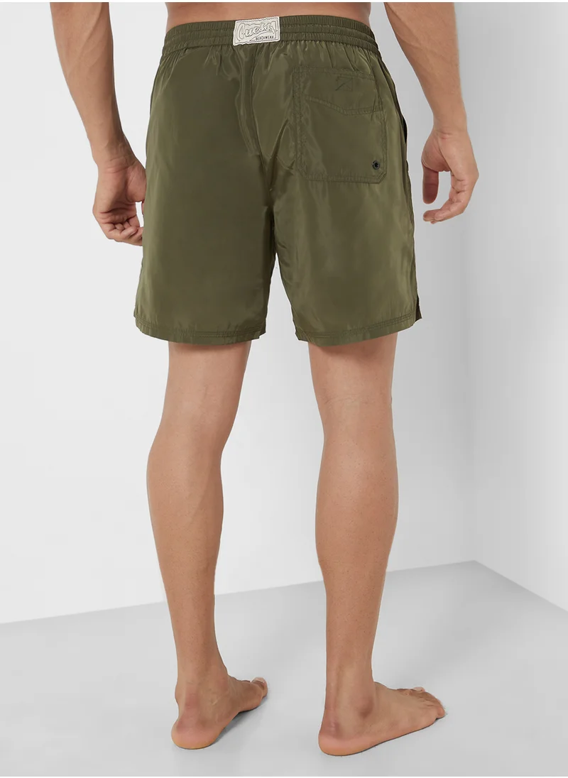 جس Logo Swim Shorts