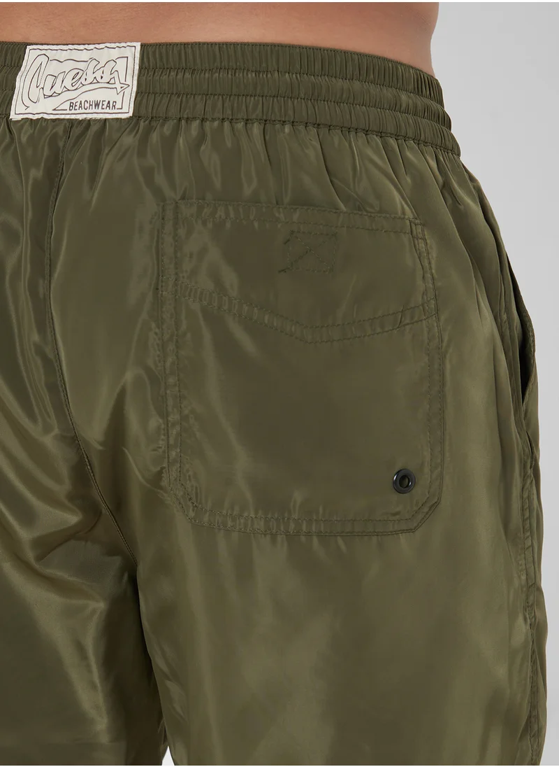 جس Logo Swim Shorts