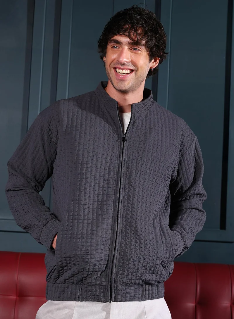 Campus Sutra Men Cubic-Tactile Bomber Jacket | Band Collar, Long Stretch-Cuff Sleeves | Zipper , Stretch-Straight Hem | Solid Textured | Woven Fabric For Casual & Daily Wear | Charcoal Black