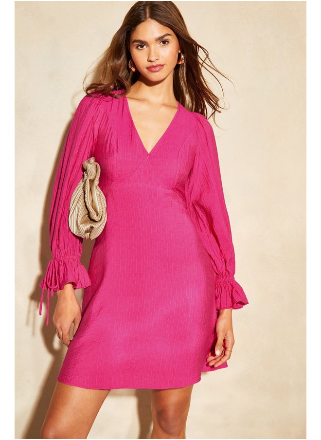Lipsy London - Lipsy Long Sleeve Tie Back Mini Dress - Image 1