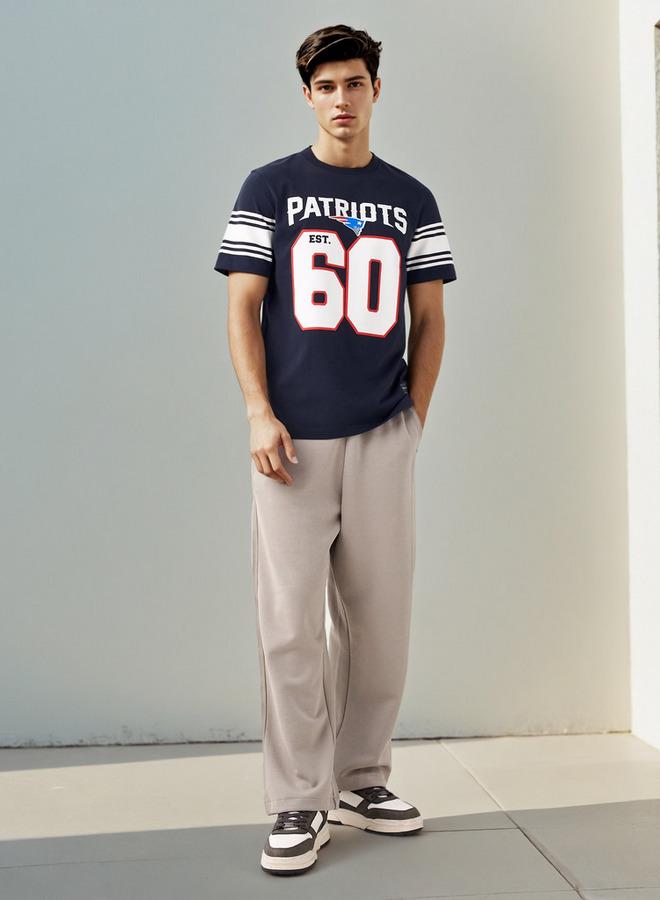 سبلاش فيڤ تيشيرت برقبة دائرية بطبعة الدوري الوطني لكرة القدم - Image 2