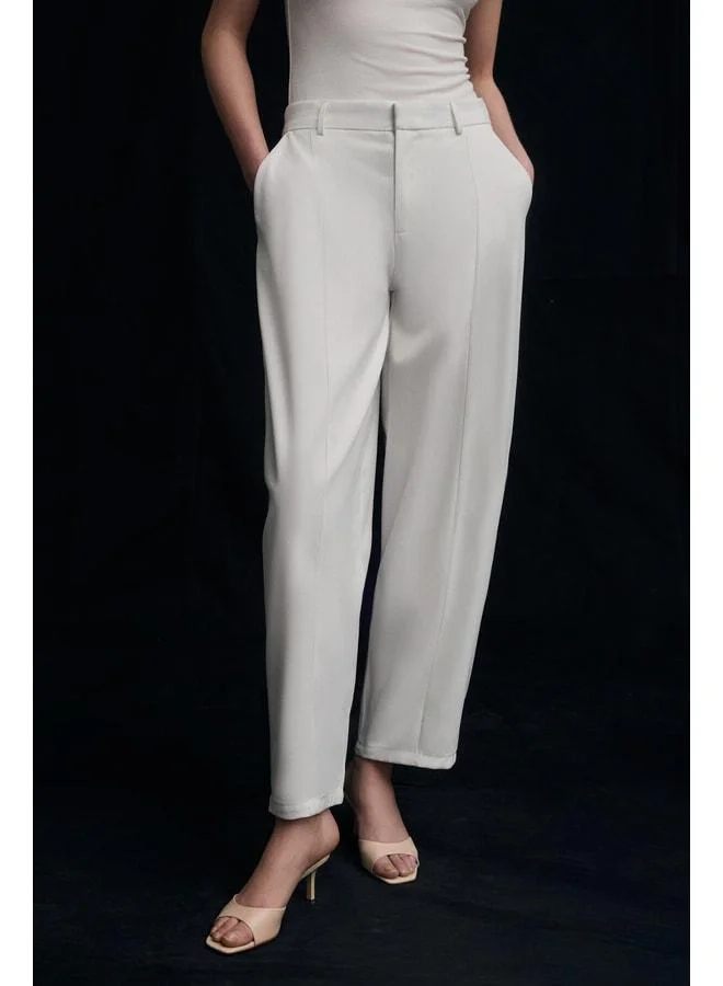 GRIMELANGE GRAZIA Women's Soft Textured Woven Fabric Balloon Leg Beige Pants.