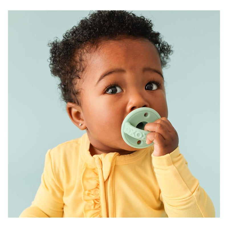 Nuby 2 Pack Silicone Pacifier with Natural Cherry Shaped Nipple - 0+ Months, 2 Pack, Colors May Vary - Image 1