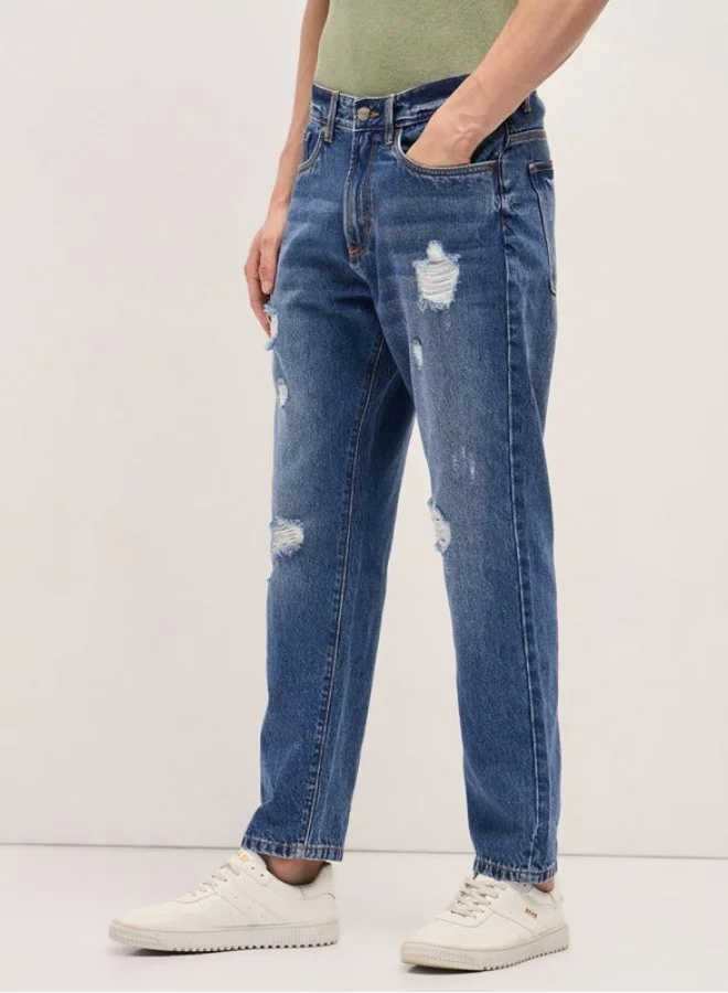 THE BEAR HOUSE  Men's Mid Blue with Light Fade Distressed Mid-Rise Relaxed Fit Jeans Classic Comfort With Modern Style, Perfect For Everyday Casual Looks And Effortless Streetwear Vibes for Men | Best Price UAE