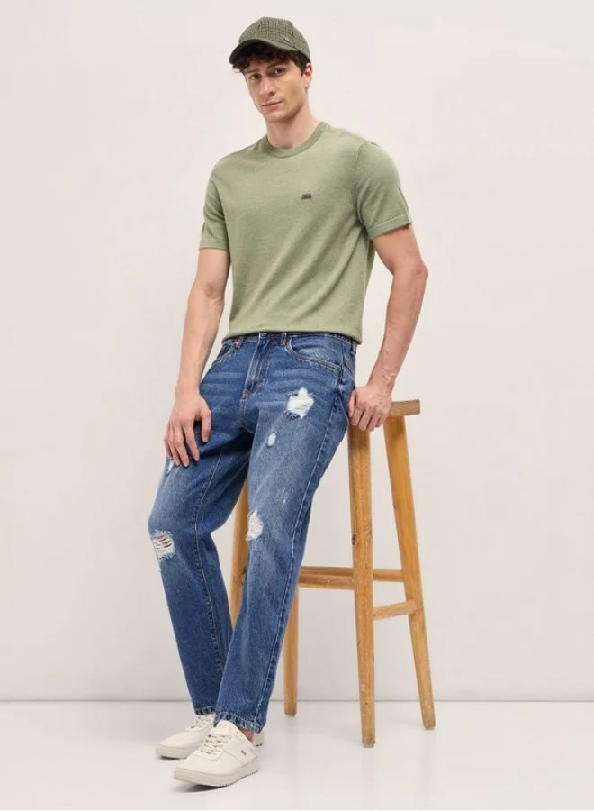 THE BEAR HOUSE  Men's Mid Blue with Light Fade Distressed Mid-Rise Relaxed Fit Jeans Classic Comfort With Modern Style, Perfect For Everyday Casual Looks And Effortless Streetwear Vibes for Men | Best Price UAE