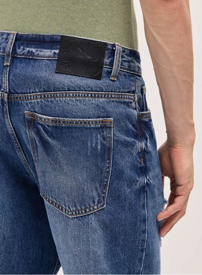 THE BEAR HOUSE  Men's Mid Blue with Light Fade Distressed Mid-Rise Relaxed Fit Jeans Classic Comfort With Modern Style, Perfect For Everyday Casual Looks And Effortless Streetwear Vibes for Men | Best Price UAE