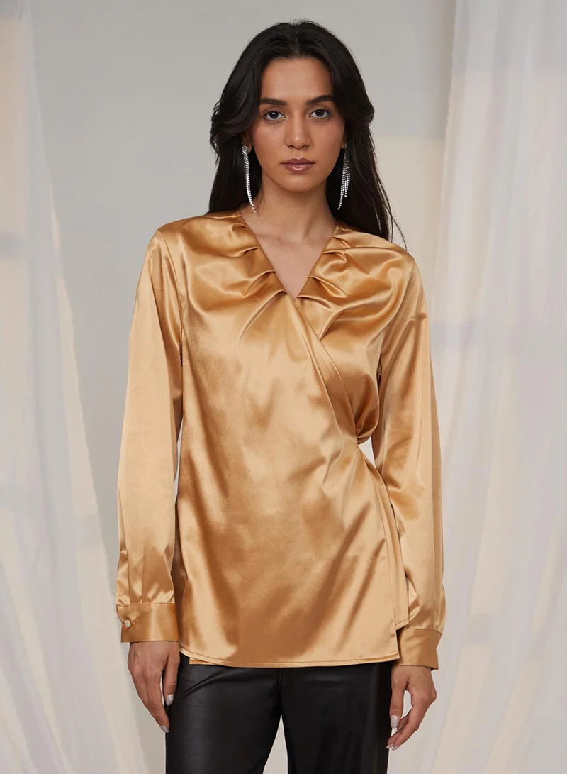 بينيا كولادا سترة علوية ملفوفة من الساتان باللون الذهبي من كاليفورنيا للسيدات