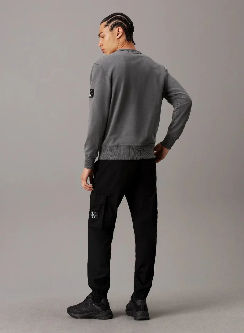 كالفن كلاين جينز بنطال كارجو بقصة سكيني، باهت