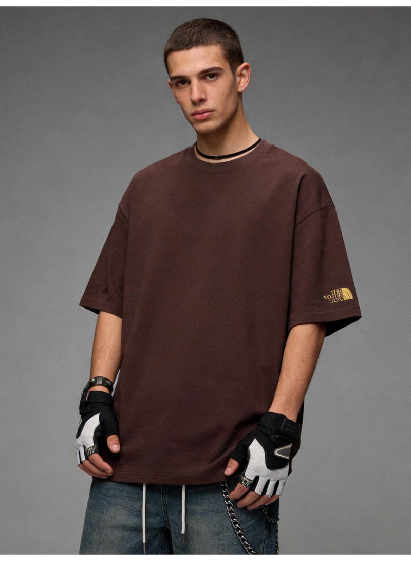 THE NORTH FACE Men's and women's T-shirts with the same style in the north face, high-grade cotton loose short sleeves with golden logo, retro street clothes for men and women. - Image 1