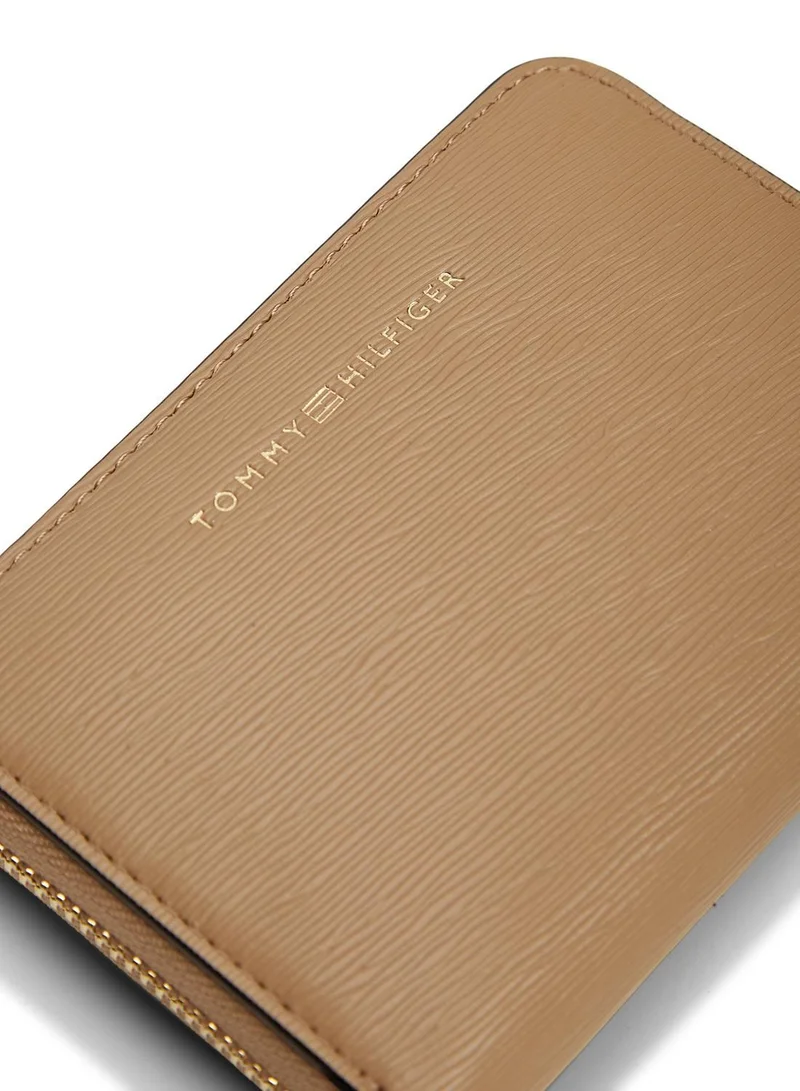 TOMMY HILFIGER Safari Canvas Metallic Logo Zip-Around Textured Wallet for Women | Best Price UAE