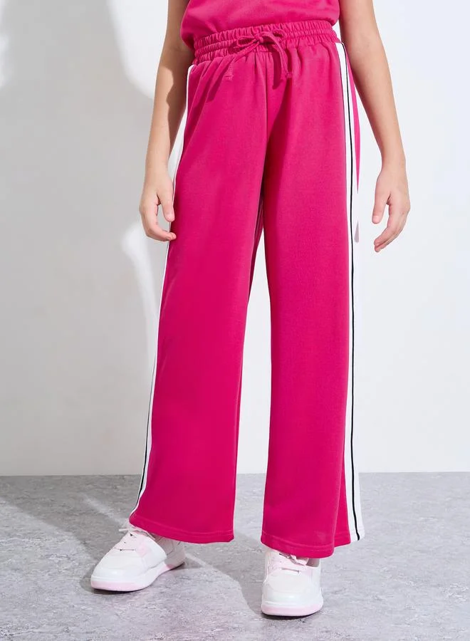 Styli  Teen Girls Pink Cap Sleeves T-Shirt and Side Striped Joggers Set for Women | Best Price UAE