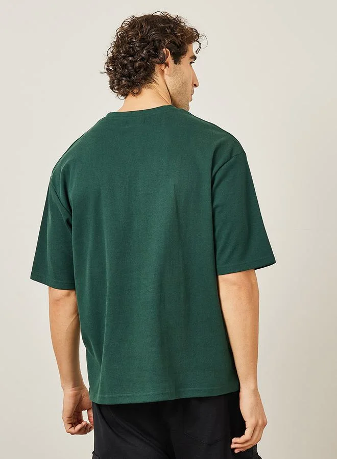 ستايلي Oversized Embroidered Slogan Interlock T-Shirt