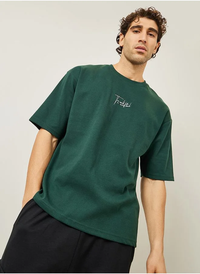 Styli Oversized Embroidered Slogan Interlock T-Shirt