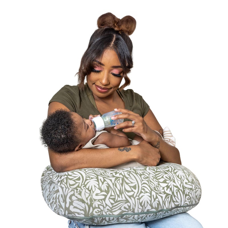 Boppy Nursing Pillow - Ergonomic Bottle & Breastfeeding Pillow, Higher, Firmer & Larger, Water-Repellent with Washable Organic Cotton Cover, Baby Safety Alliance Verified - Green Cut Out Leaves - Image 1