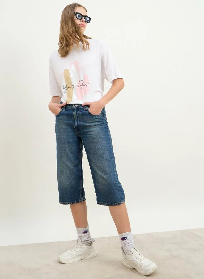 ستايلي تيشيرت طويل فضفاض بطبعة جرافيك فويل ستايلي يور فيوتشر