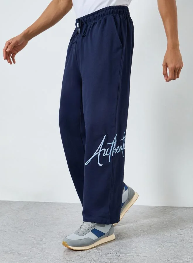Men Navy Blue Embroidered Slogan Joggers