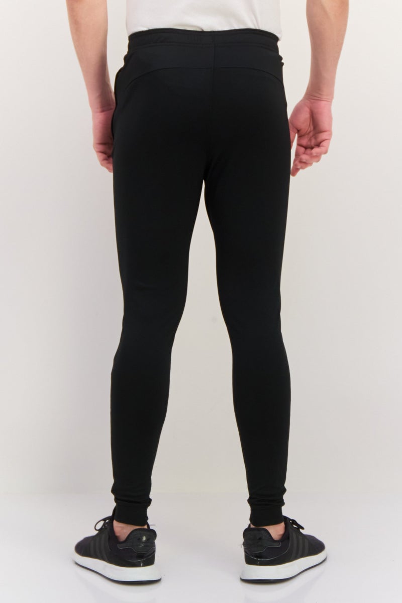 Nike سروال تدريب ضيق للرجال بشعار العلامة التجارية، أسود - Image 3