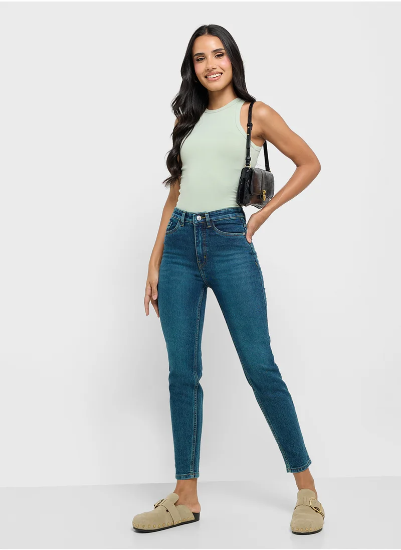 جينجر High Rise Skinny Jeans