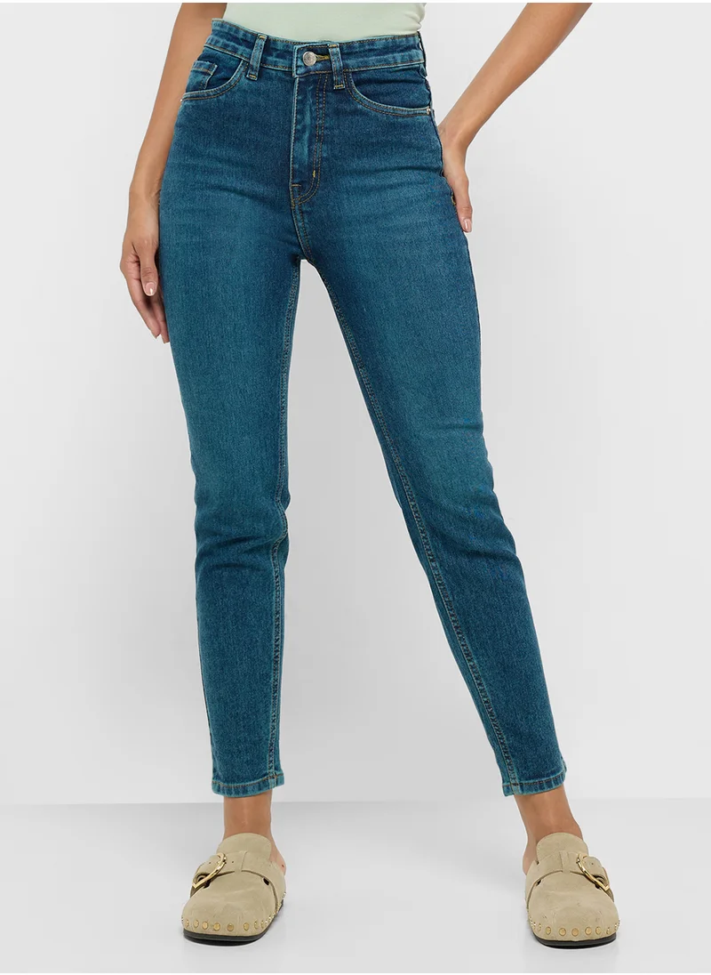جينجر High Rise Skinny Jeans