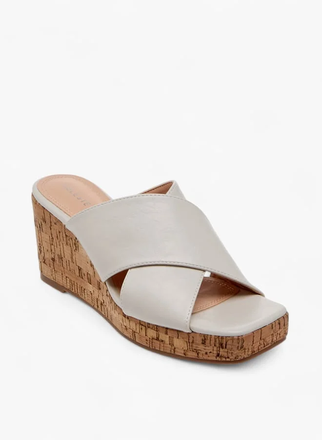 سيليست صنادل نسائية سهلة الارتداء بكعب ويدج بلون سادة