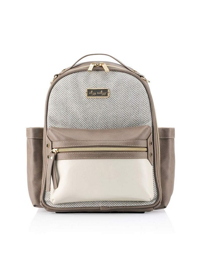 Itzy Ritzy Itzy Ritzy Mini Diaper Bag Backpack - Chic Mini Diaper Bag with Changing Pad, 8 Total Pockets (4 Internal and 4 External), Grab-Top Handle and Rubber Feet (Vanilla Latte) - Image 1