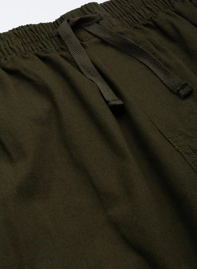 The Indian Garage Co Olive Men Olive Green Relaxed Fit Solid Cargo Pants for Men | Best Price UAE