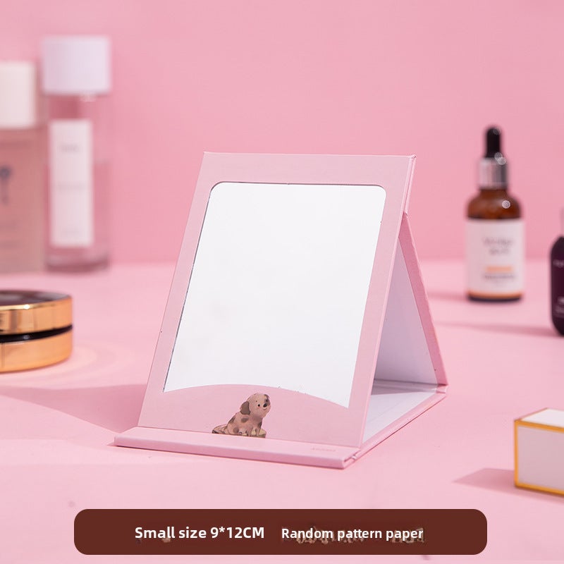 Portable makeup mirror folding desktop HD student dormitory Princess Mirror female large small size desktop dressing mirror(Small size 9 * 12cm pattern random-paper) - Image 1