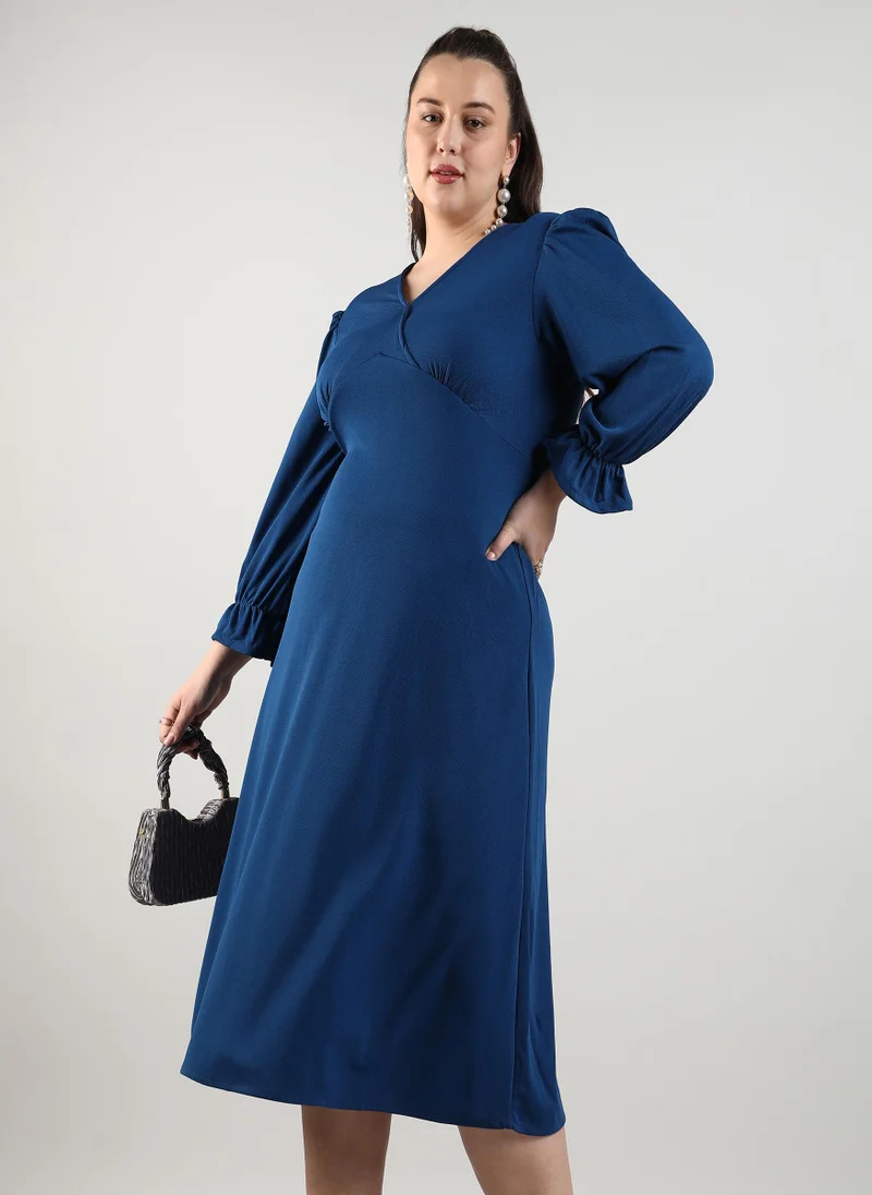 Instafab Plus Women's Indigo Blue Solid Cut-Out Midi Dress For Casual Wear | V Neck | Long Sleeve | Button Closure | Plus-Size Dress Crafted With Comfort With For Everyday Wear