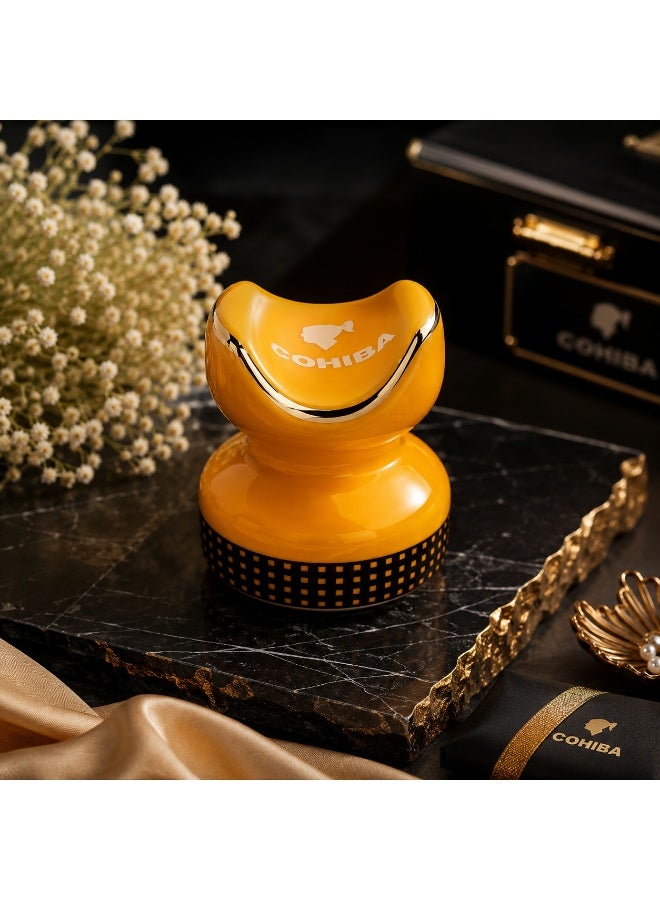 A luxurious cigar holder with a distinctive design made of polished ceramic, combining luxury and practicality. Adorned with gold detailing for a touch of sophistication, it's the perfect piece to elevate your cigar-smoking experience. - Image 1