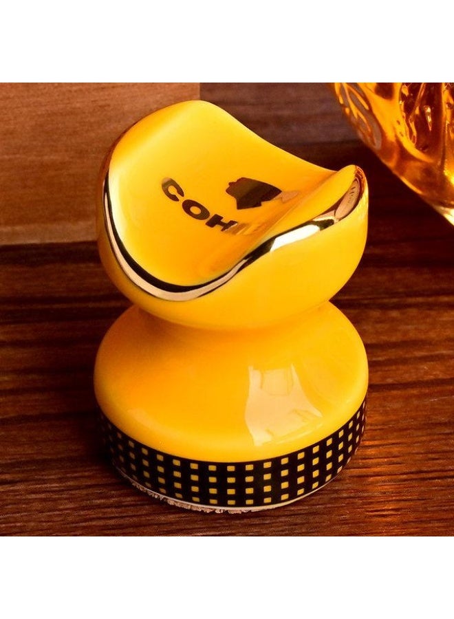 A luxurious cigar holder with a distinctive design made of polished ceramic, combining luxury and practicality. Adorned with gold detailing for a touch of sophistication, it's the perfect piece to elevate your cigar-smoking experience. - Image 3