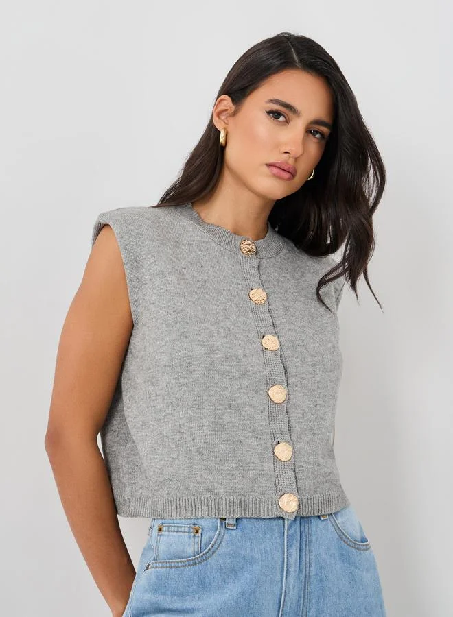 ستايلي Styli Solid Buttoned Sleeveless Top with Shoulder Pad Detail