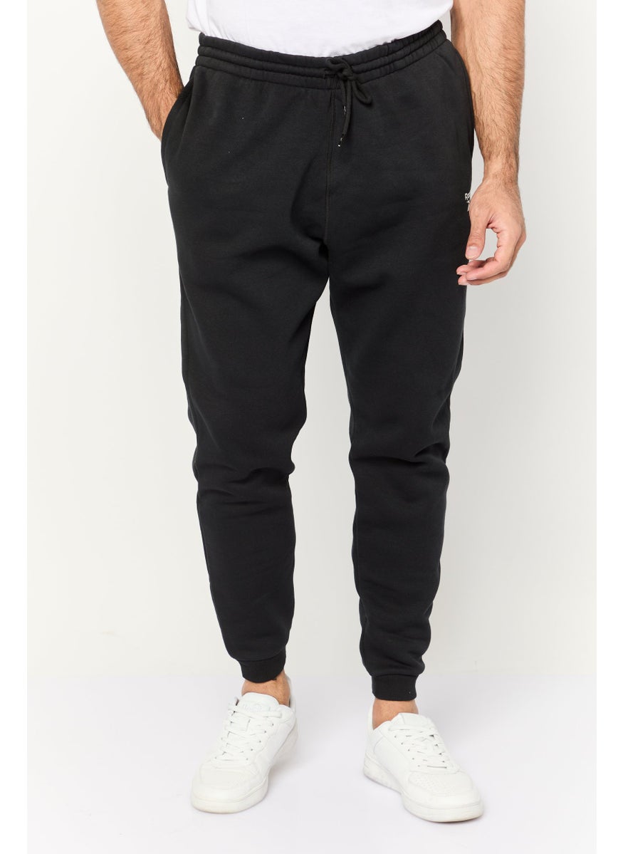 Reebok Men Sportswear Fit Running Sweatpants, Black  - Image 1