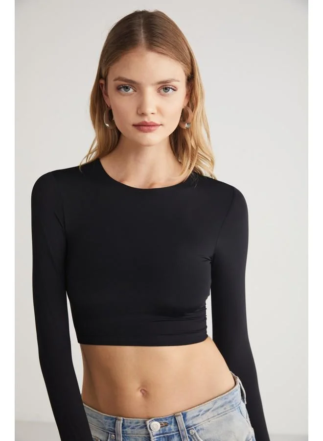 GRIMELANGE Grimelange Jovana Women's Crew Neck Stretch Long Sleeve Crop Black Blouse