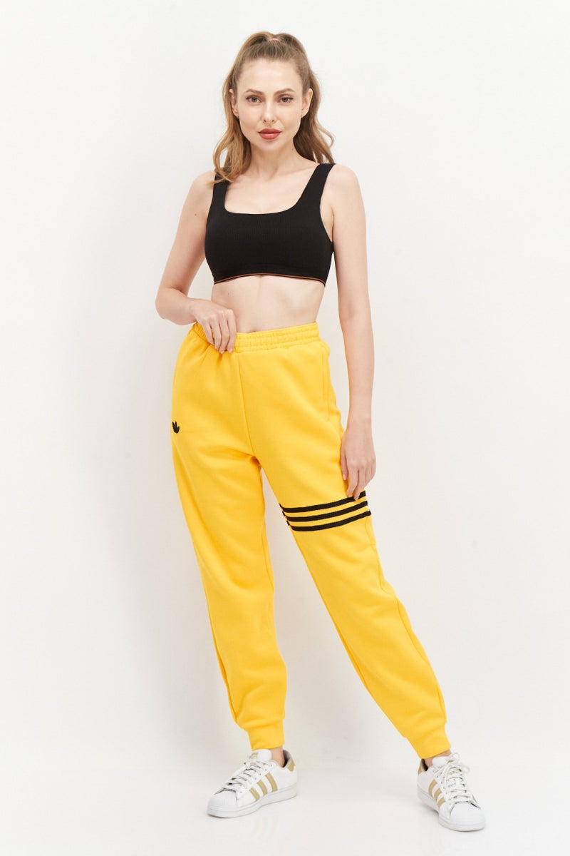 adidas Originals Women Sportswear Fit Outdoor Jogger Pants, Collegiate Gold  - Image 4