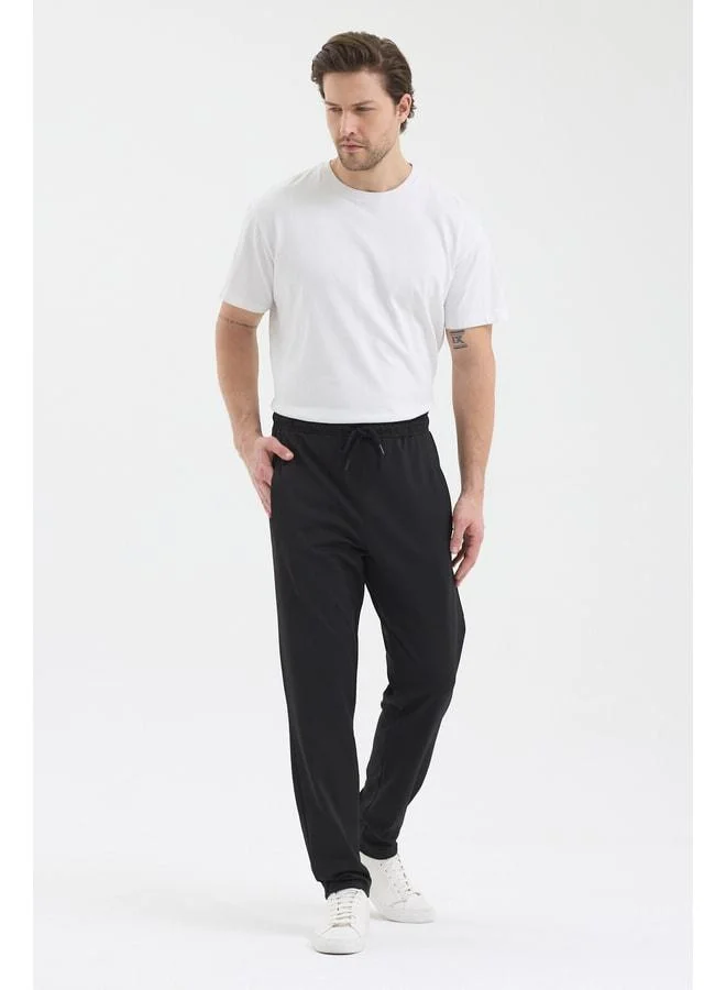 Mmetalic  Men's Black Jogger Sweatpants with Zipper Pocket, Elastic Waist, Dive Fabric, Straight Leg, Comfortable Cotton. for Men | Best Price UAE