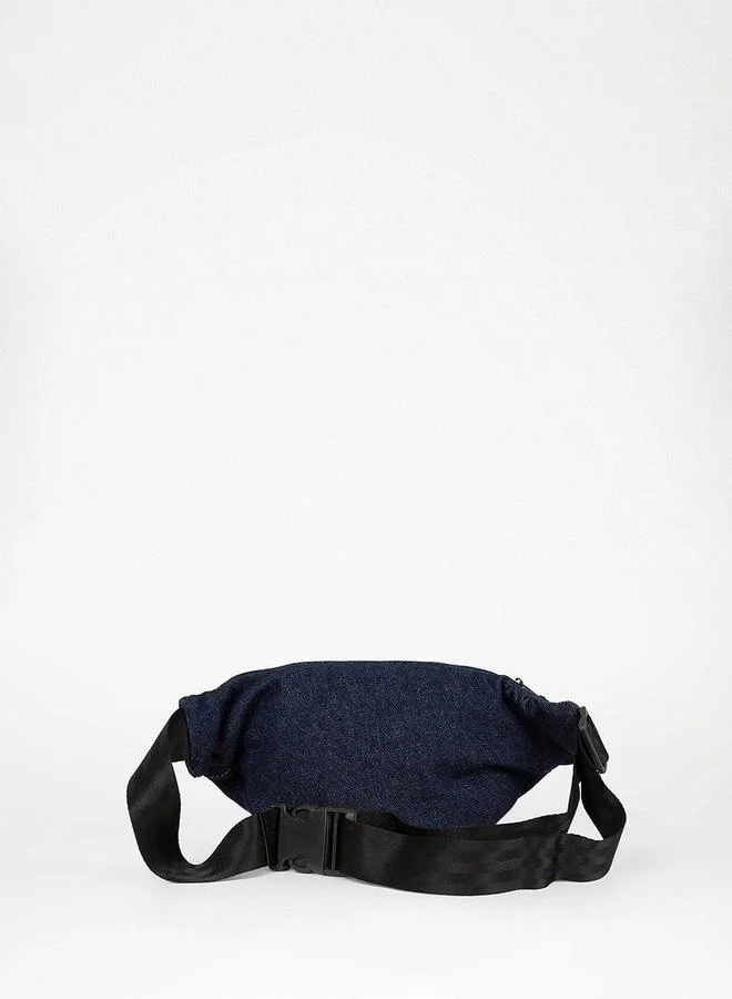 ديفاكتو شنطة خصر مُرقعة بشارة