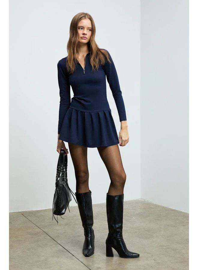 Grimelange  ISANDRIA Women's polo‑collared dress with front zipper detail, long sleeves, waist‑fitted, pleated mini navy dress. for Women | Best Price UAE