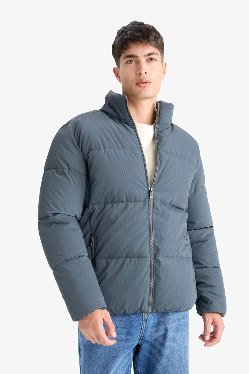 Defacto  Regular Fit Waterproof High Neck Zippered Puffer Jacket for Men | Best Price UAE