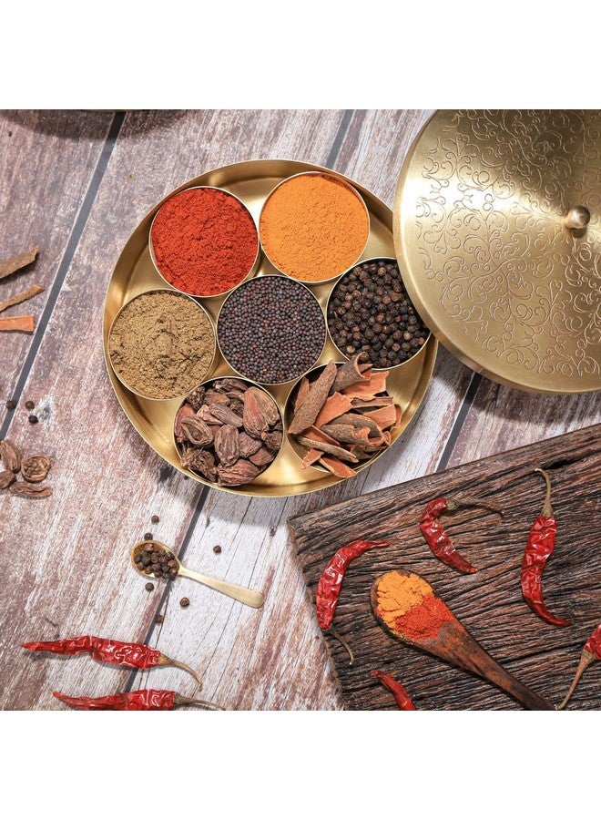 The Advitya Brass Masala Box For Kitchen|Spices Storage Containers|Handmade Golden Masala Container/Spice Box With Embossed Lid 7 Compartments And 1 Spoon (7 Inch, Small) - Image 1