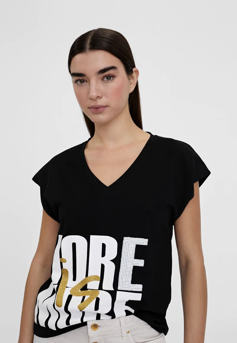 Lola Casademunt T-shirt with more is more positioning