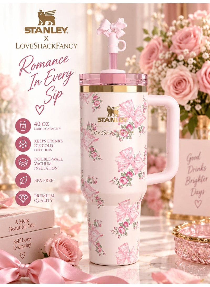 ستانلي x لوف شاك فانسي Holiday Quencher H2.0 FlowState سعة 40 أونصة، كوب ستانلس ستيل بعزل حراري مزدوج مع مقبض وغطاء 3 وضعيات وشفاطة قابلة لإعادة الاستخدام وزينة فيونكة، وردي مزهر - Image 1