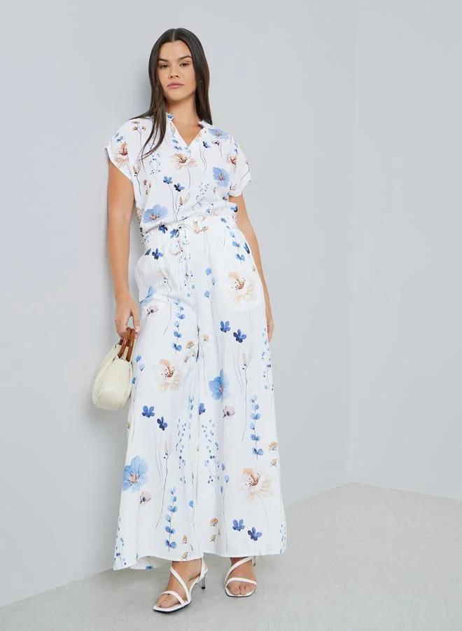 تايك تو بنطال بأرجل واسعة وطبعة زهور